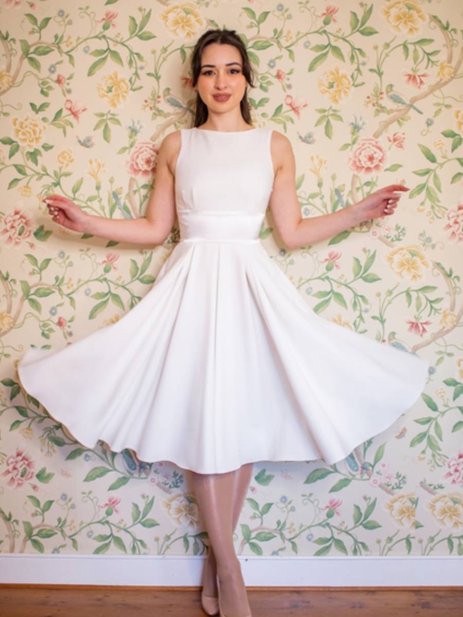 the pretty dress company Priscilla Blue Hawaii Midi Add our vintage style Petticoat to add volume and complete the look with a matching Large Satin Hair Bow The Pretty Dress Company Tilly